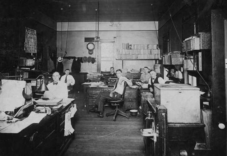 Group portrait of timekeeping workers in their office in Grand Island, Nebraska