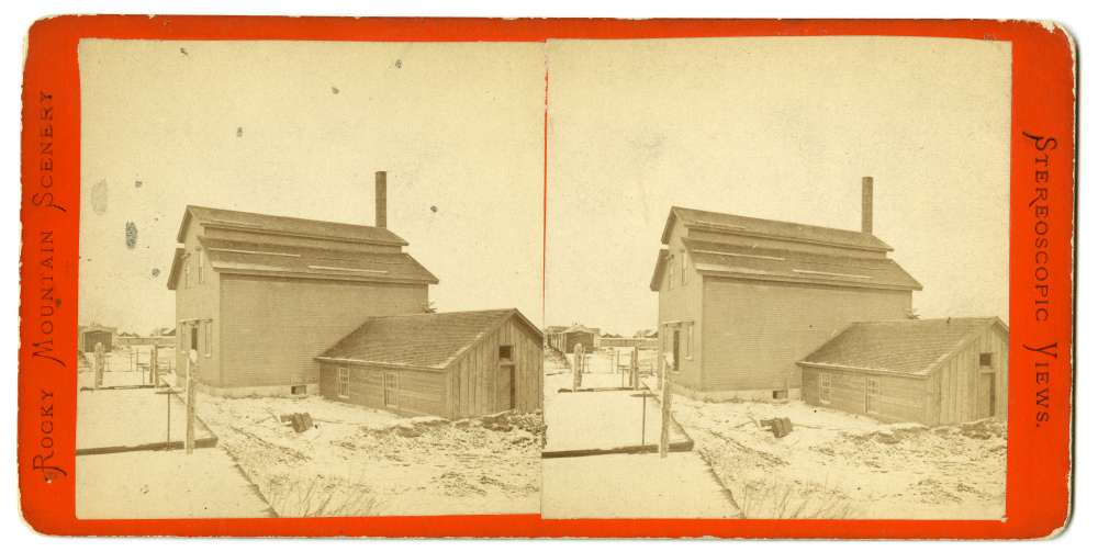 A stereo card showing a gristmill in Grand Island, Nebraska
