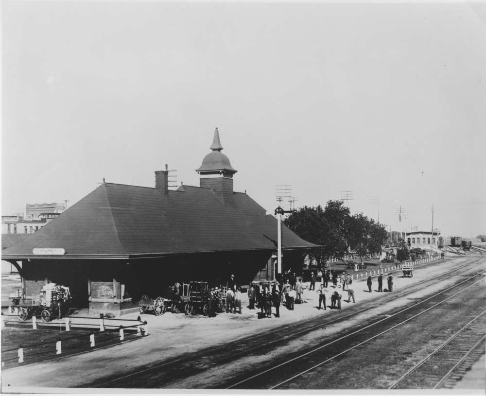 Photograph showing a Union Pacific passenger depot and rail yards in Kearney, Nebraska