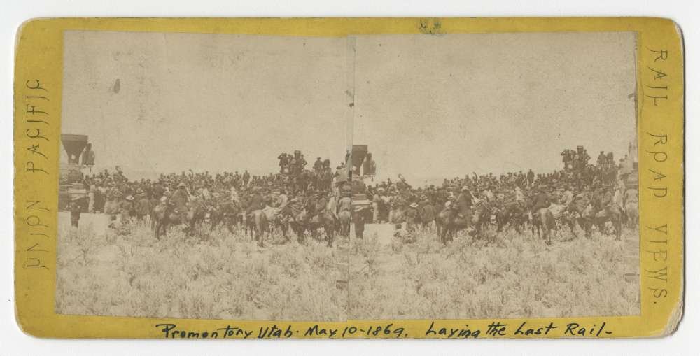 A stereo card showing the laying of the last rail at Promontory