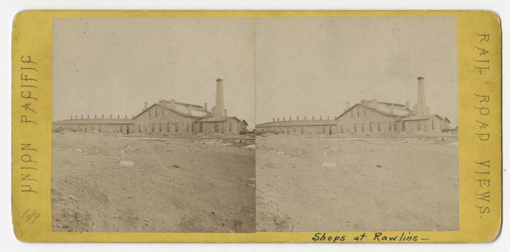 A stereo card showing machine shops at Rawling Springs, Wyoming