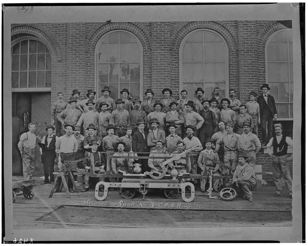 Group photograph of personnel at Machine Shop No. 3 in Sacramento, California. 1876