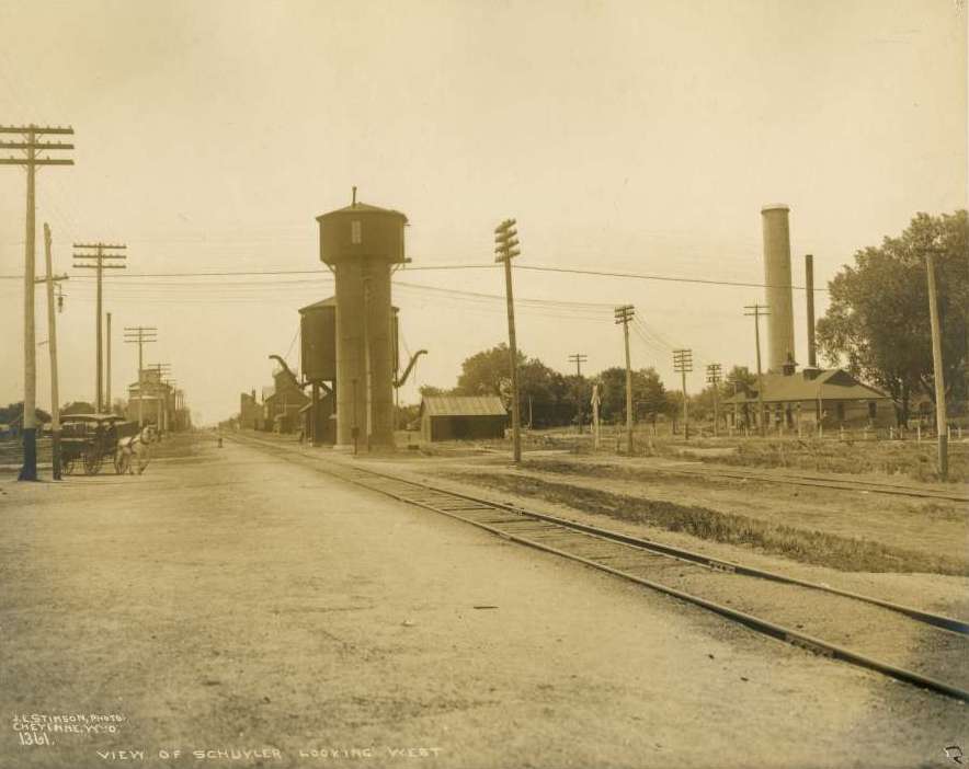 A view of Schuyler, Nebraska looking west shows the water softener and tank along the line