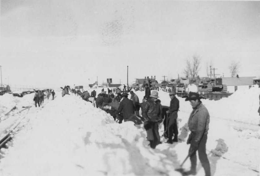 Union Pacific Railroad employees dig out track after the famous 1949 blizzard