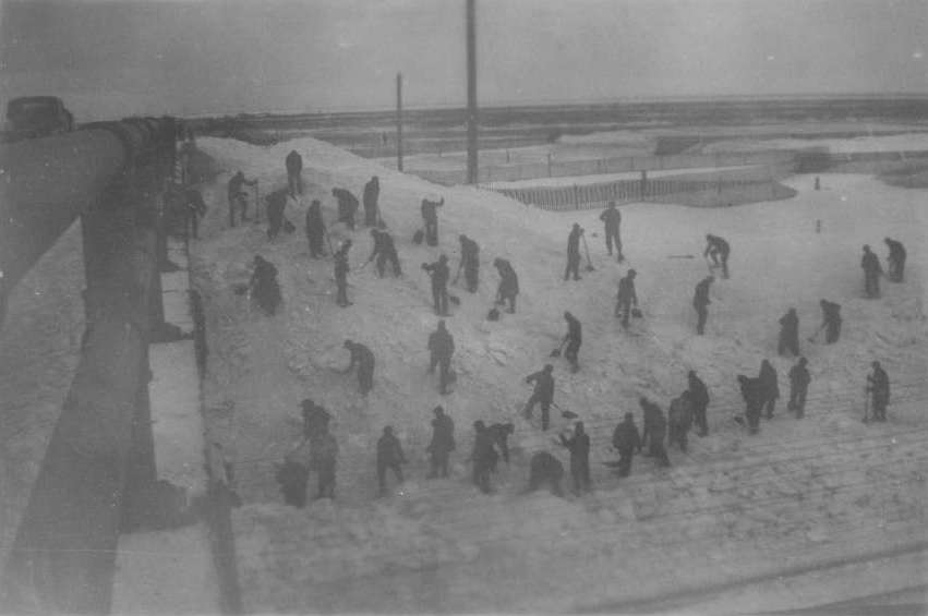 Union Pacific employees clear tracks by hand after the famous 1949 blizzard